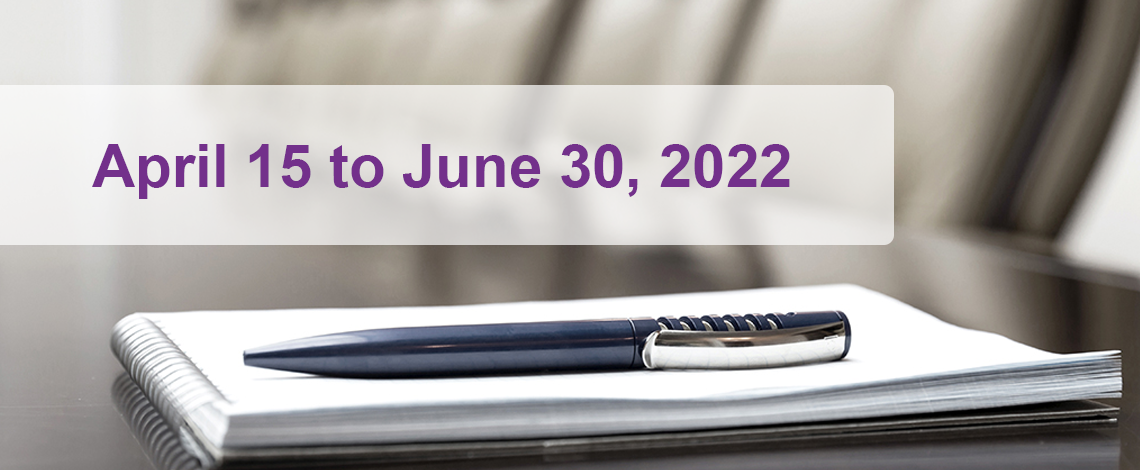 A pen placed on a notebook. Text displays “April 15 to June 30, 2022.”