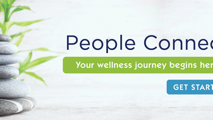 Stacked formation of pebbles in front of bamboo leaves. Text displays: “People Connect. Your wellness journey begins here. Get Started."