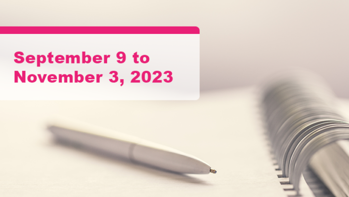 A pen placed on a notebook. Text displays “September 9, 2023 to November 3, 2023”