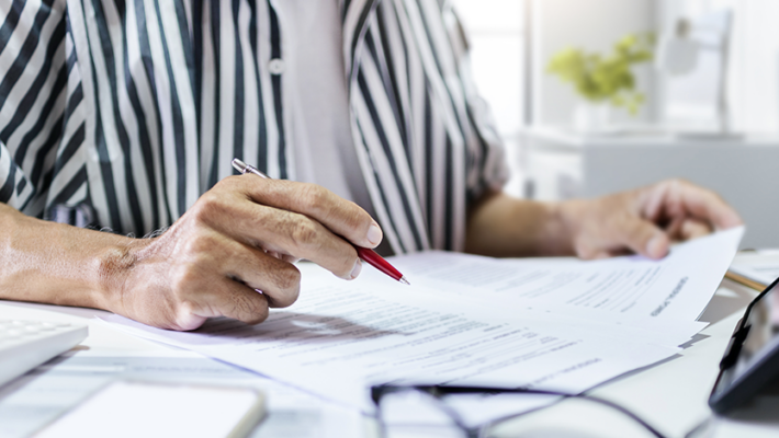 Person looking at documents.